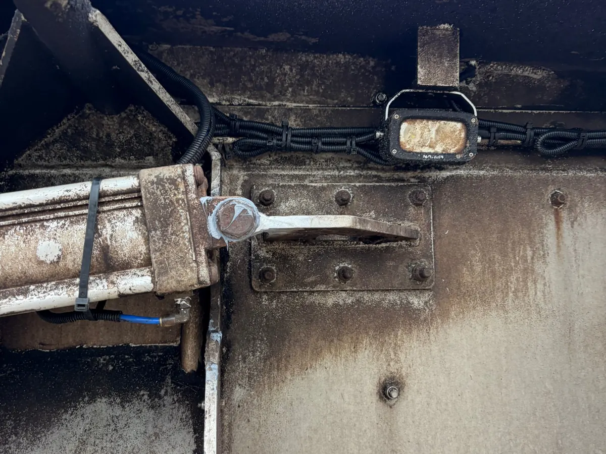 Reworked aluminium lug TIG welded back onto a semi-trailer in Newbridge, with the tarp actuator pinned to it