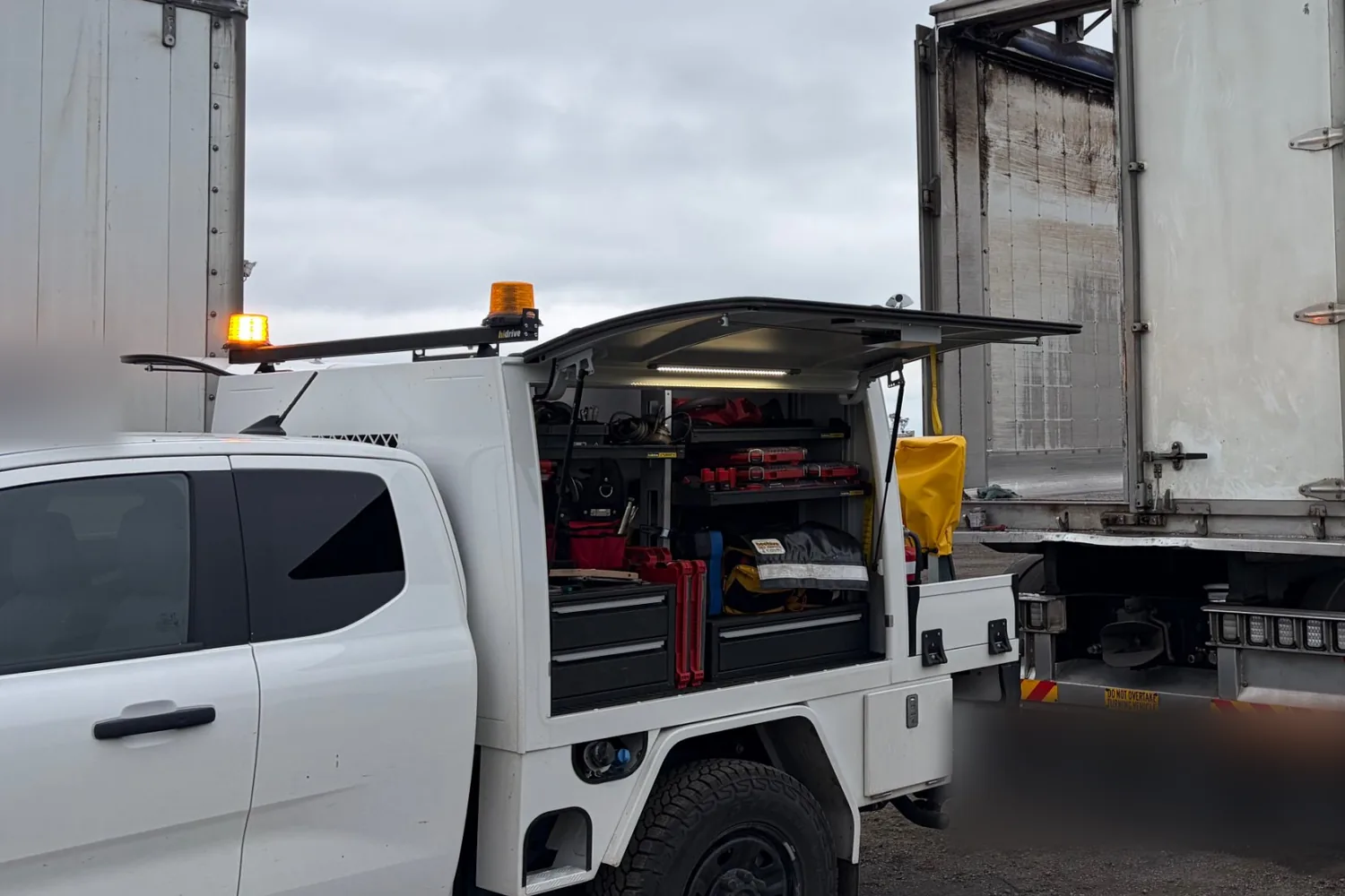 Truck trailer repair in Newbridge: Troy’s site-ready ute set up at the open rear doors of an aluminium semi-trailer