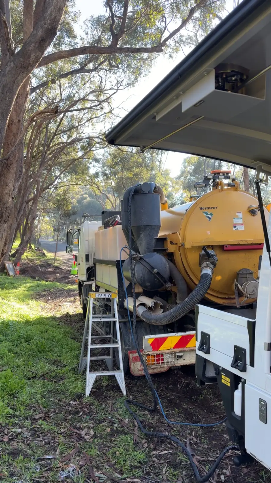 Troy repairing a non-destructive vacuum excavation truck on-site near Bendigo